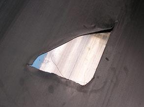 Torn conveyor belt Torn conveyor belt