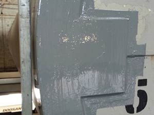 Plate bonded in place and a protective coating applied Plate bonded in place and a protective coating applied