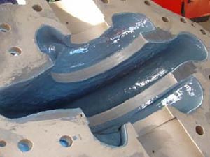 Abraded pump casing coated with Belzona 1391 Abraded pump casing coated with Belzona 1391