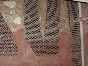 Failed tube sheet coating, resulting in corrosion Failed tube sheet coating, resulting in corrosion