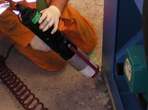 Injection of 1121 (Super XL-Metal) to create an irregular shim Injection of 1121 (Super XL-Metal) to create an irregular shim