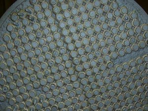 Grit blasted surface of badly corroded tube sheet Grit blasted surface of badly corroded tube sheet